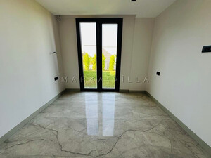 MUĞLA YALIKAVAKTA SİTE İÇİNDE DENİZ MANZARALI MODERN LÜKS SATILIK VİLLA