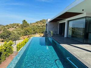 MUĞLA YALIKAVAKTA SİTE İÇİNDE DENİZ MANZARALI MODERN LÜKS SATILIK VİLLA