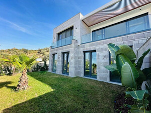 MUĞLA YALIKAVAKTA SİTE İÇİNDE DENİZ MANZARALI MODERN LÜKS SATILIK VİLLA